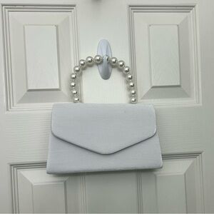 Elegant White Pearl Handle Clutch
